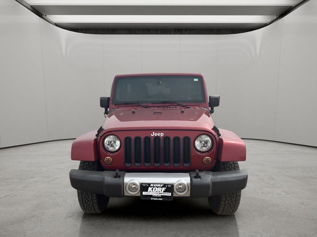 Used 2012 Jeep Wrangler Unlimited Sahara with VIN 1C4BJWEG1CL184236 for sale in Sterling, CO